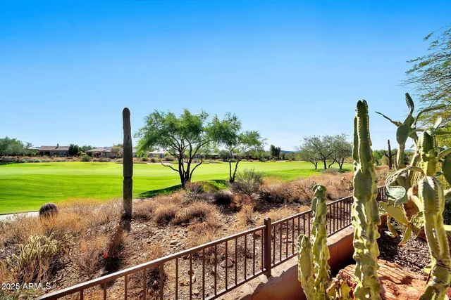a view of a street with a park