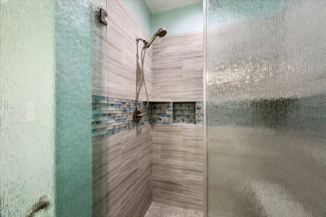 a view of storage and utility room with washer and dryer