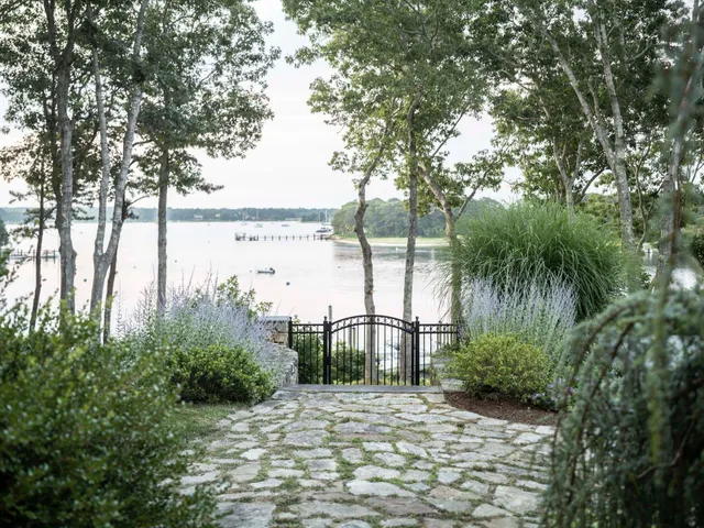 a living room filled with furniture and a window