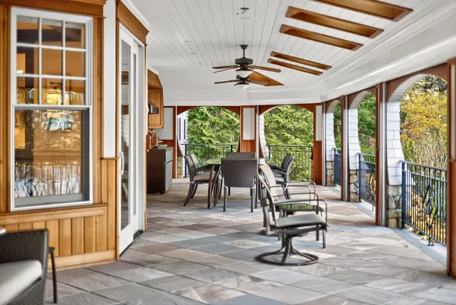 a view of a dining room with furniture window and outside view