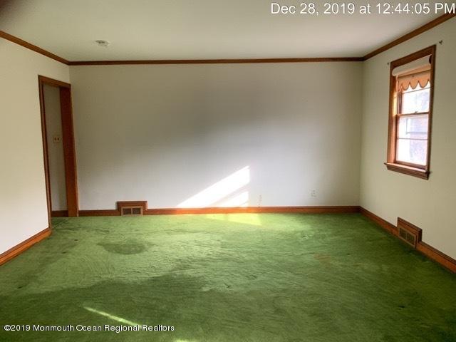 28 Yellowbrook Road Freehold, NJ 07728 - Photo 5 of 9 an empty room with a natural light