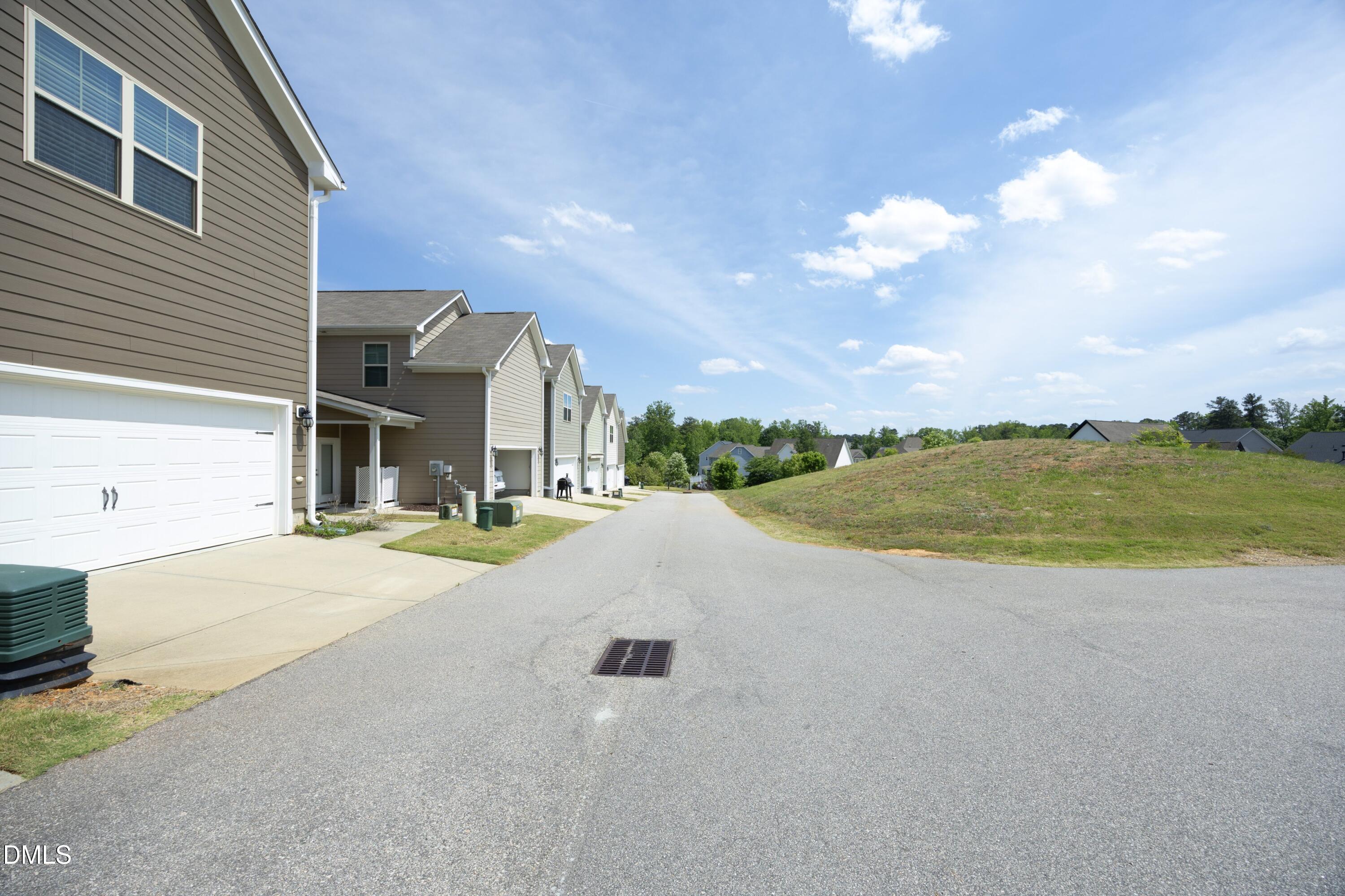 824 Country Downs Road Wake Forest, NC 27587 - Photo 7 of 41 a view of a house with a ocean view