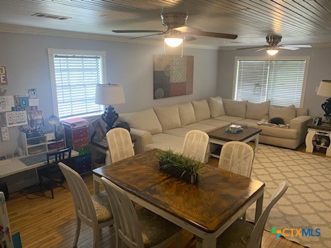 319 West Village Road Salado, TX 76571 - Photo 11 of 24 a living room with furniture and a chandelier