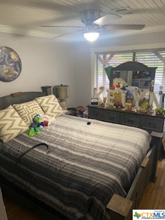 319 West Village Road Salado, TX 76571 - Photo 4 of 24 a bedroom with a bed and a window