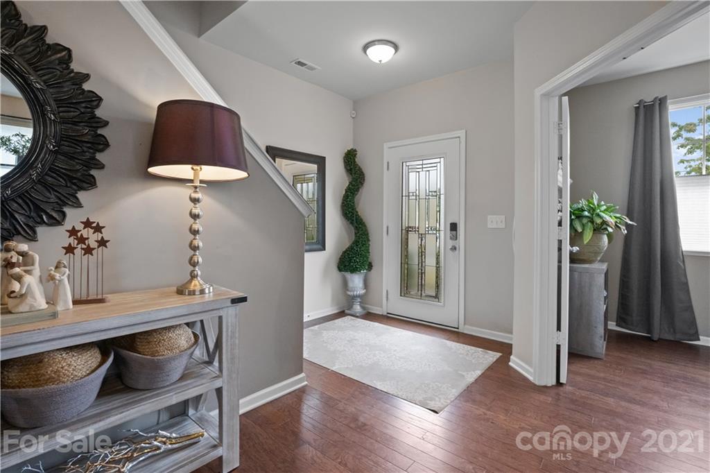 2714 Aldergrove Road Matthews, NC 28105 - Photo 2 of 23 a view of room with furniture and wooden floor
