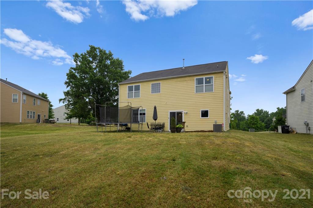 2714 Aldergrove Road Matthews, NC 28105 - Photo 23 of 23 a view of a house with a yard