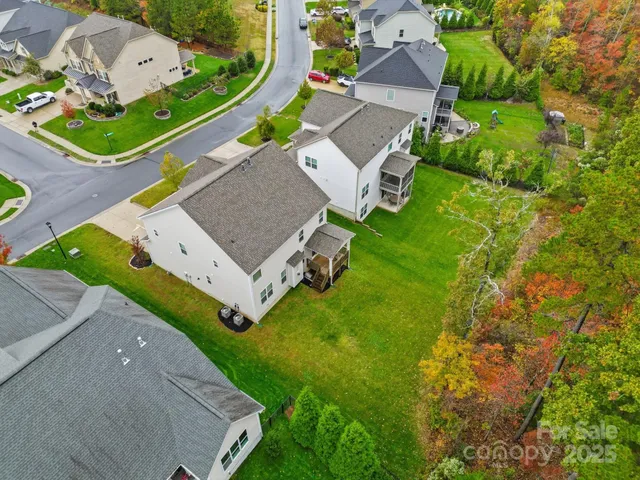 an aerial view of a house with a garden