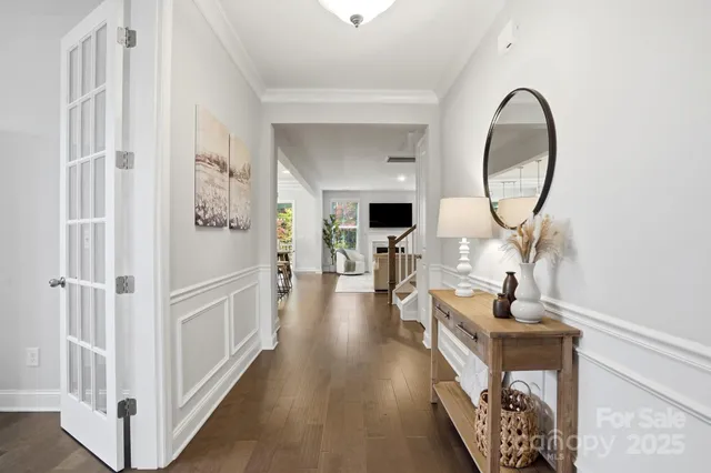 a view of a livingroom with furniture and entryway