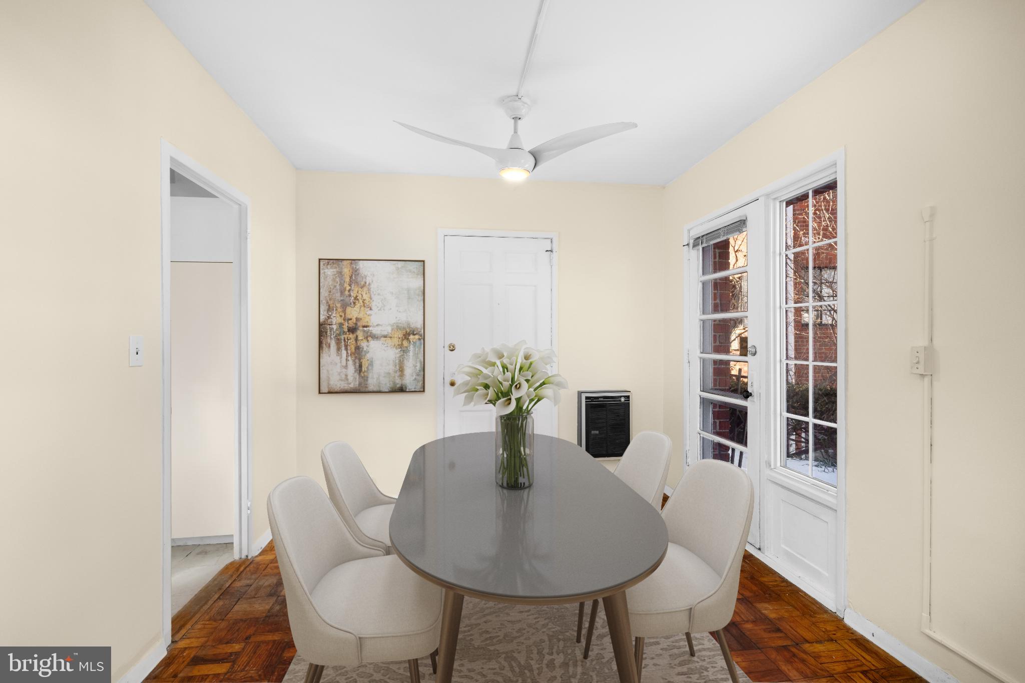 1663 Fitzgerald Lane Alexandria, VA 22302 - Photo 5 of 9 a view of a dining room with furniture and wooden floor