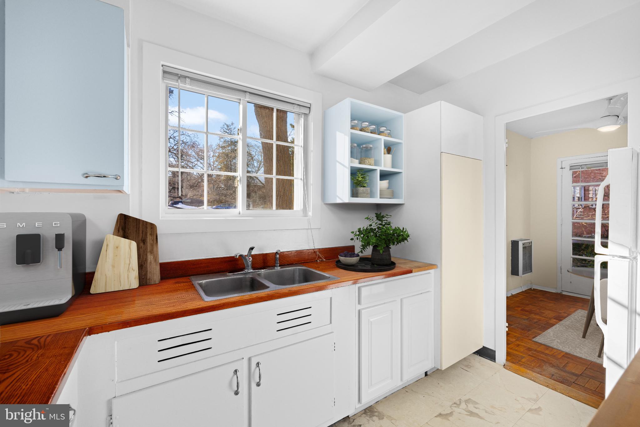 1663 Fitzgerald Lane Alexandria, VA 22302 - Photo 6 of 9 a kitchen that has a sink and cabinets