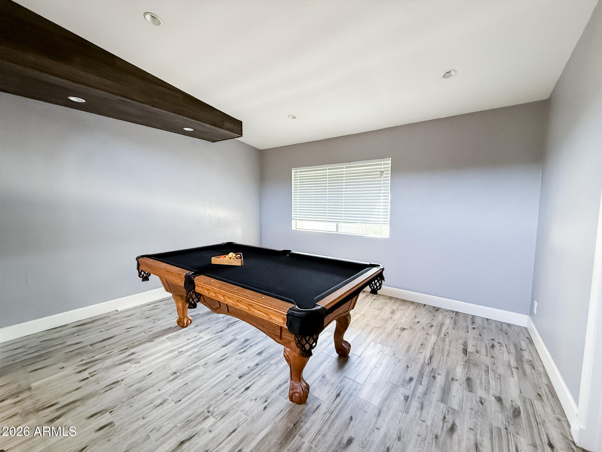 5100 North Miller Road, Unit 3 Scottsdale, AZ 85250 - Photo 20 of 31 a room with wooden floor and a window