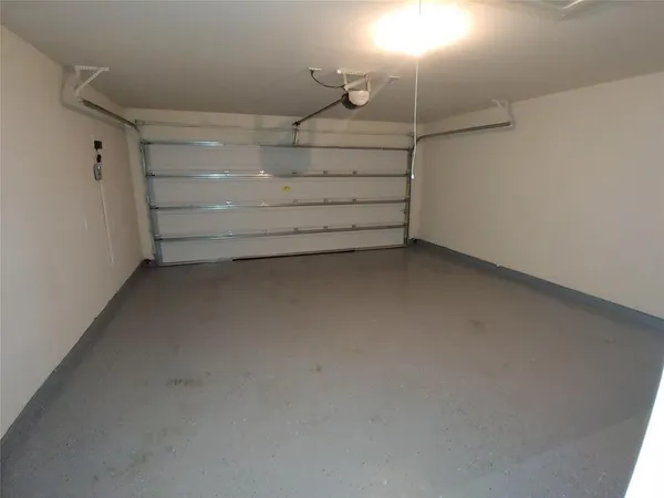 a empty room with a ceiling fan