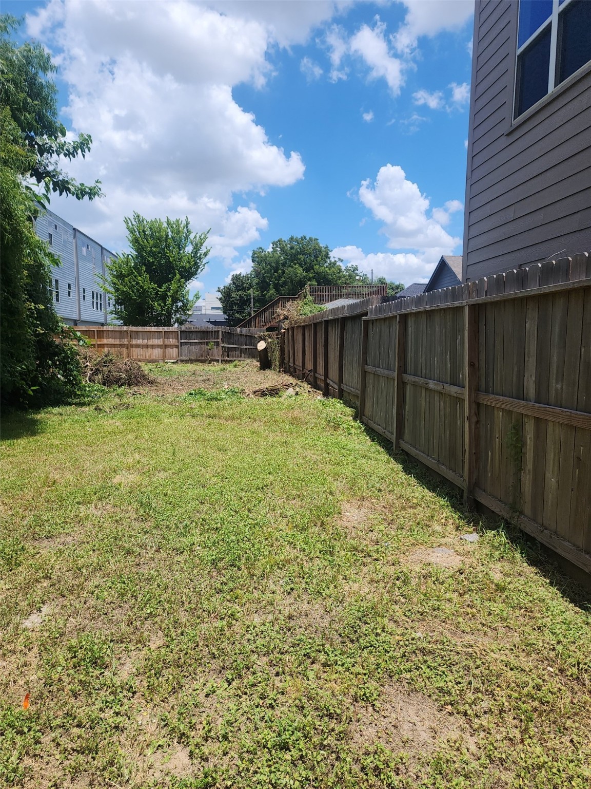 2213 Berry Street Houston, TX 77004 - Photo 3 of 5 a view of backyard with wooden fence