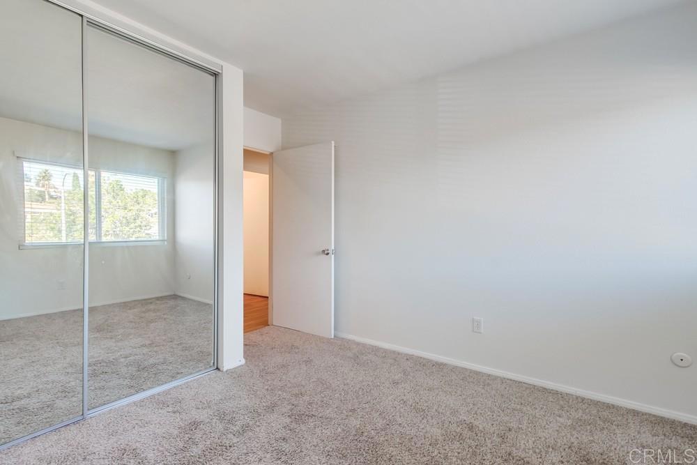 12643 Robison Boulevard, Unit 213 Poway, CA 92064 - Photo 34 of 49 a view of an empty room with window