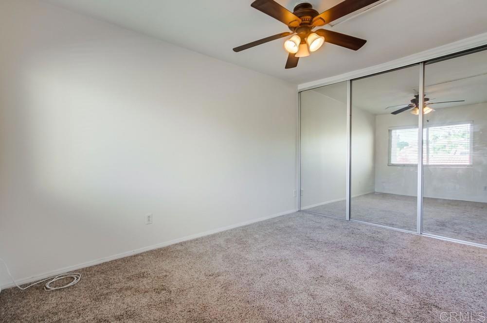 12643 Robison Boulevard, Unit 213 Poway, CA 92064 - Photo 38 of 49 an empty room with windows and fan