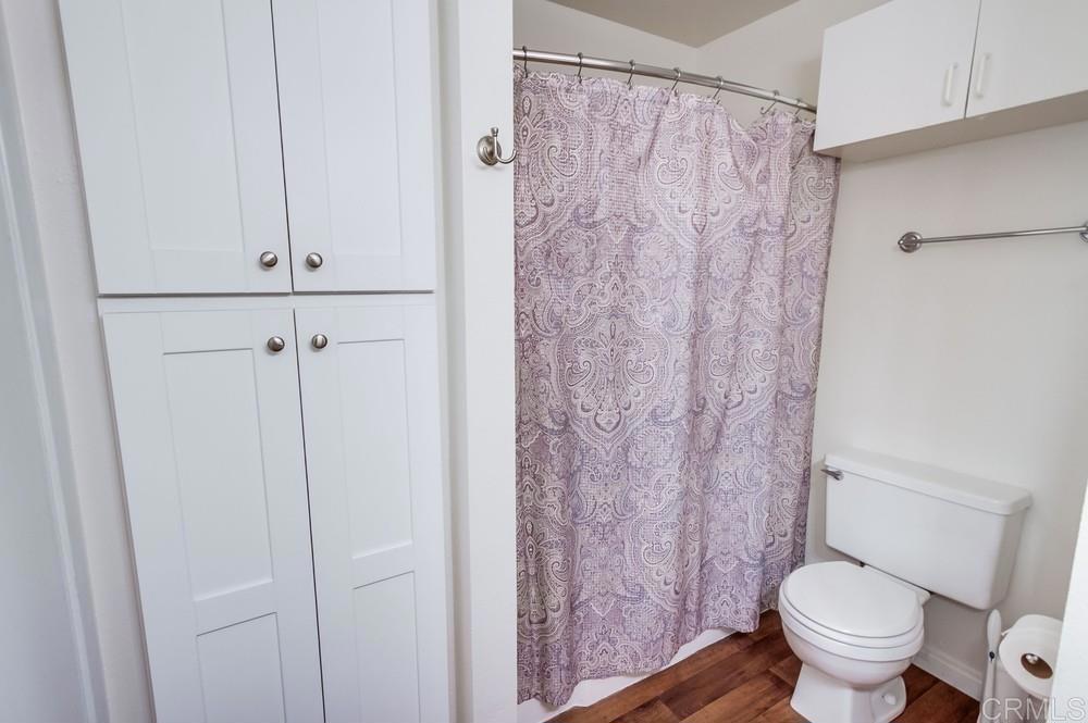 12643 Robison Boulevard, Unit 213 Poway, CA 92064 - Photo 41 of 49 a bathroom with a toilet and a shower