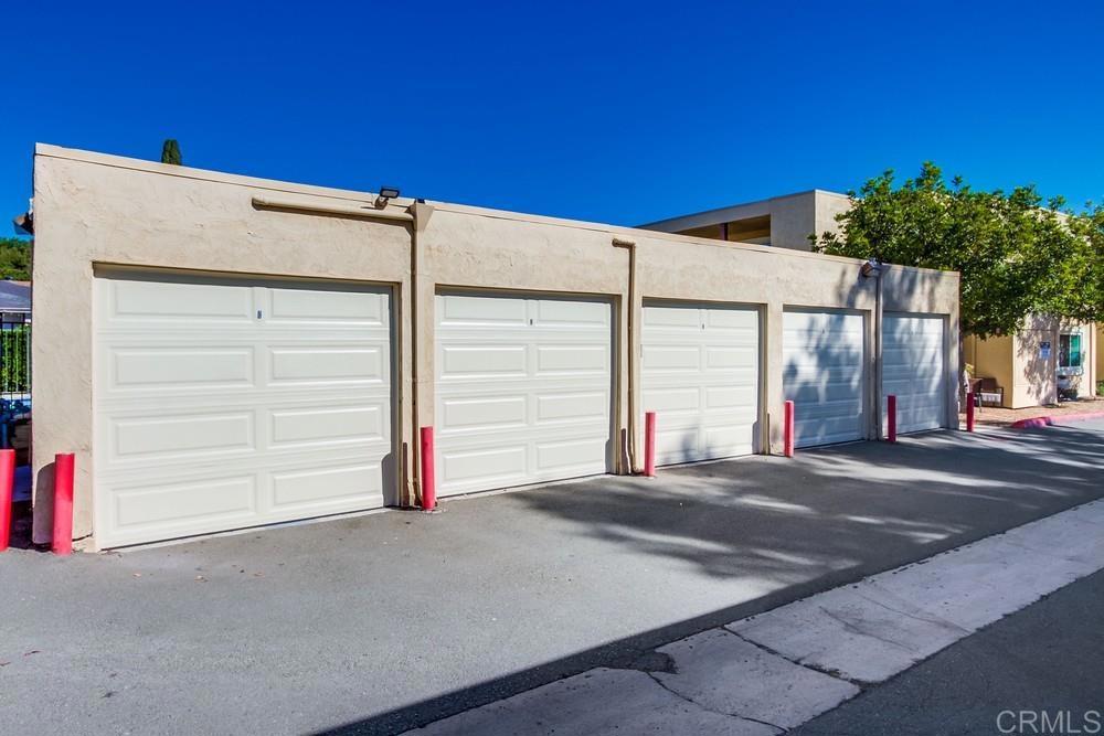 12643 Robison Boulevard, Unit 213 Poway, CA 92064 - Photo 46 of 49 a view of the house with garage and plants