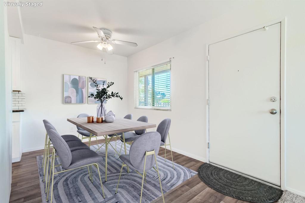 12643 Robison Boulevard, Unit 213 Poway, CA 92064 - Photo 9 of 49 a view of a dining room with furniture and chandelier