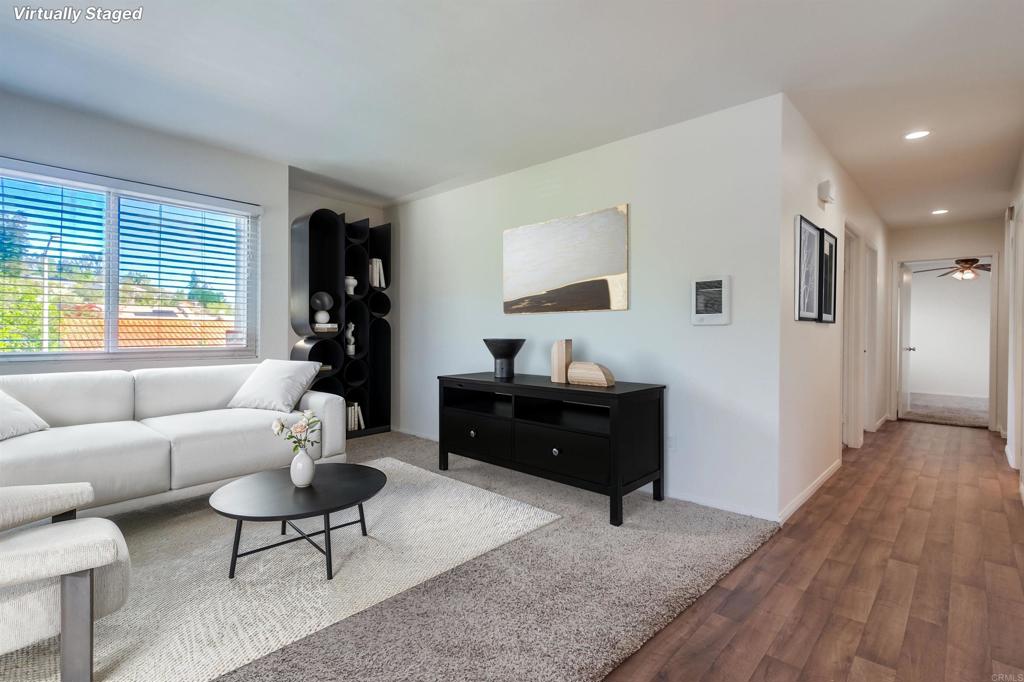 12643 Robison Boulevard, Unit 213 Poway, CA 92064 - Photo 10 of 49 a living room with furniture and a window
