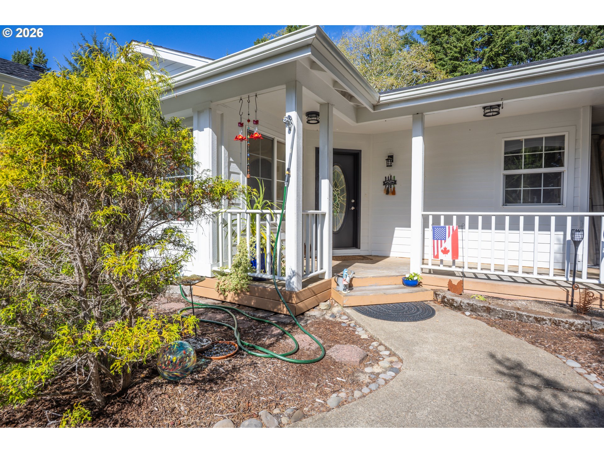 2193 13th Street Florence, OR 97439 - Photo 1 of 48 a view of backyard of the house