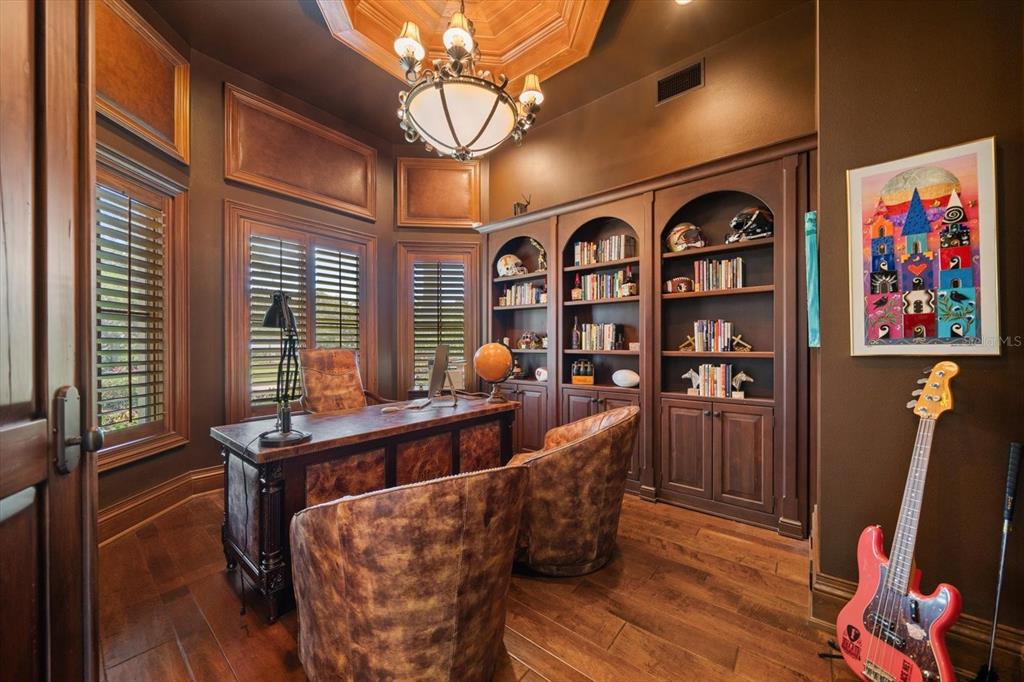 10930 Spring Street Largo, FL 33774 - Photo 28 of 100 a living room with furniture a rug and a large window