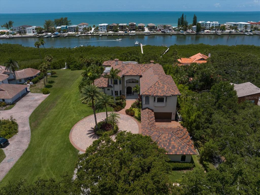 10930 Spring Street Largo, FL 33774 - Photo 91 of 100 an aerial view of a house with a lake view
