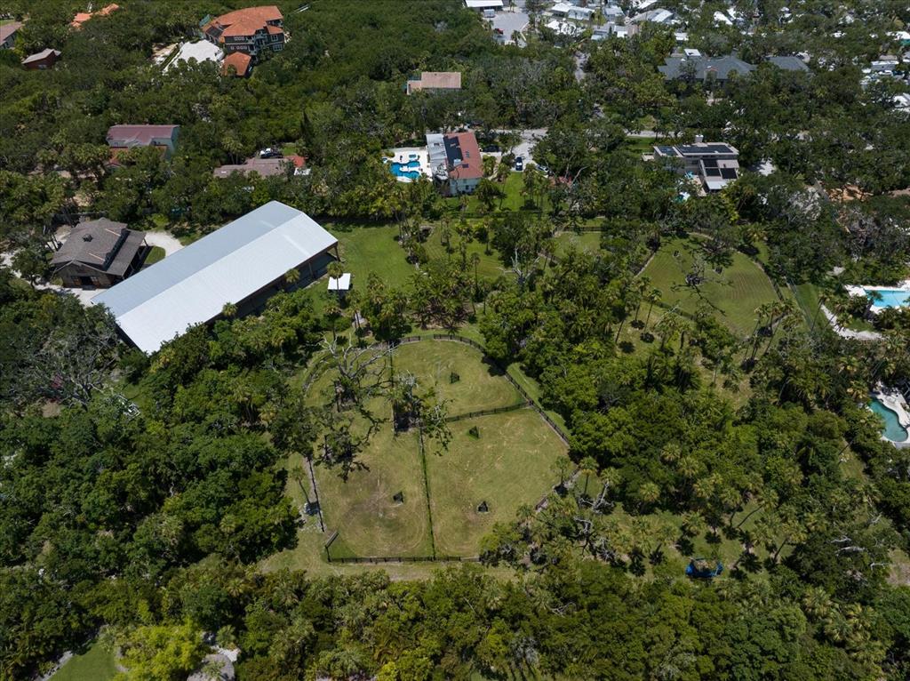 10930 Spring Street Largo, FL 33774 - Photo 99 of 100 an aerial view of a house with a yard