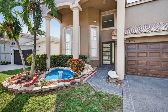 a view of an empty room with stairs