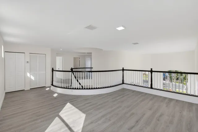 a view of a tree in a yard