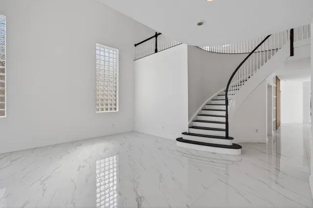 an empty room with windows