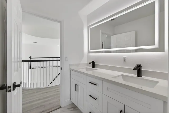 a view of a house with backyard sitting area and garden