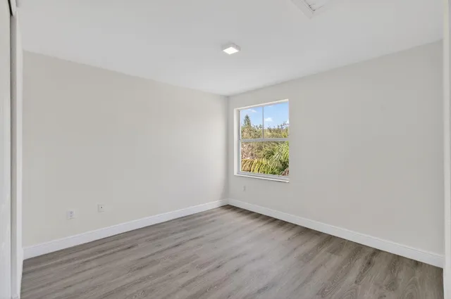 a view of a golf course with a lake