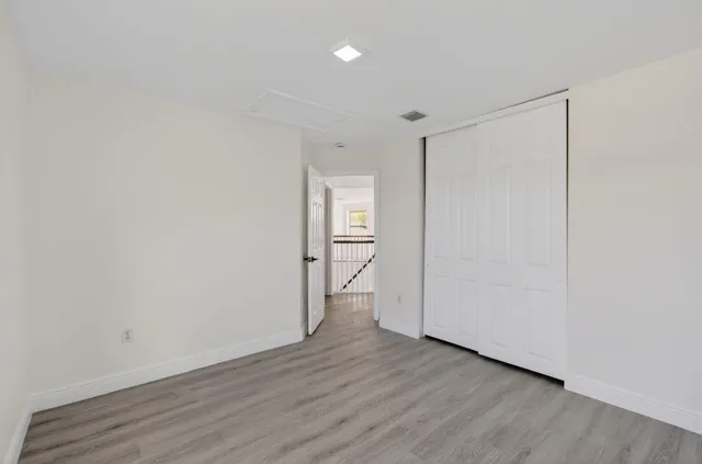 a view of a golf course with a lake