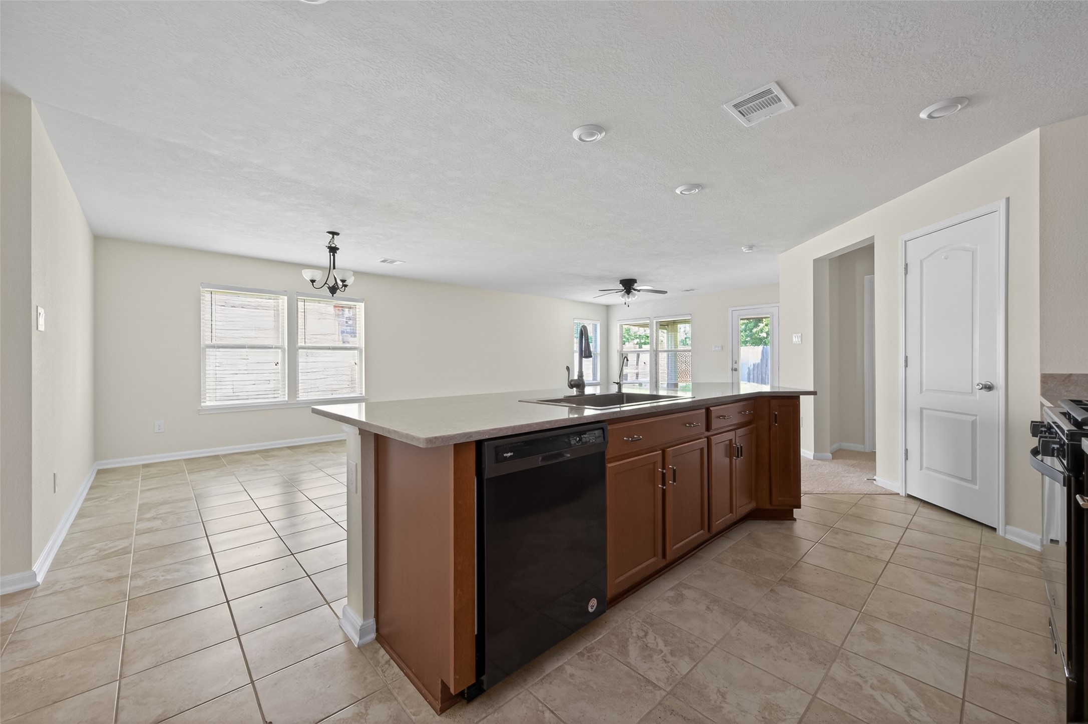 2754 Cayden Creek Way Conroe, TX 77304 - Photo 15 of 40 a kitchen with a sink and cabinets