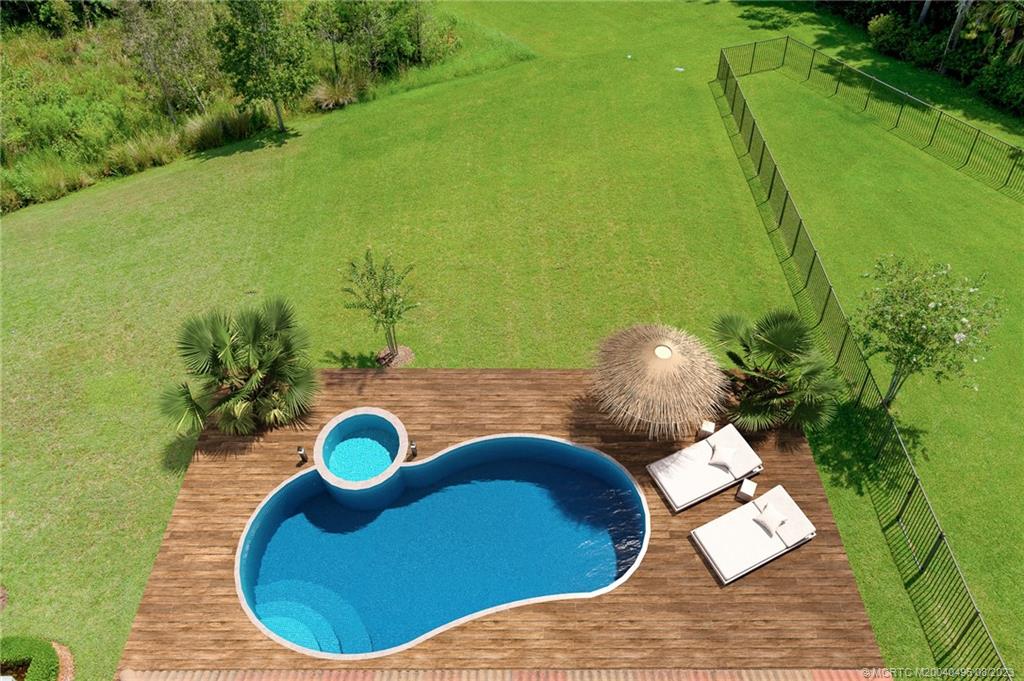 5891 Southeast Entry Court Stuart, FL 34997 - Photo 20 of 29 a view of sitting area with furniture