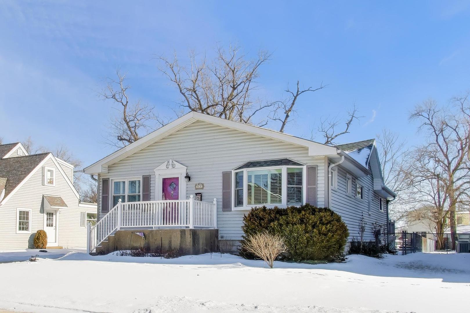 365 Walnut Street Elmhurst, IL 60126 - Photo 2 of 19 a front view of a house with a yard