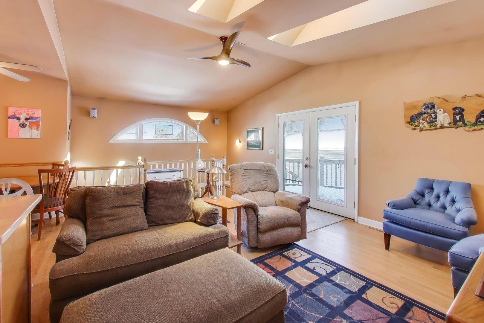 365 Walnut Street Elmhurst, IL 60126 - Photo 5 of 19 a living room with furniture and a large window