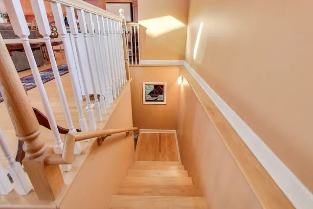 a view of balcony with wooden floor