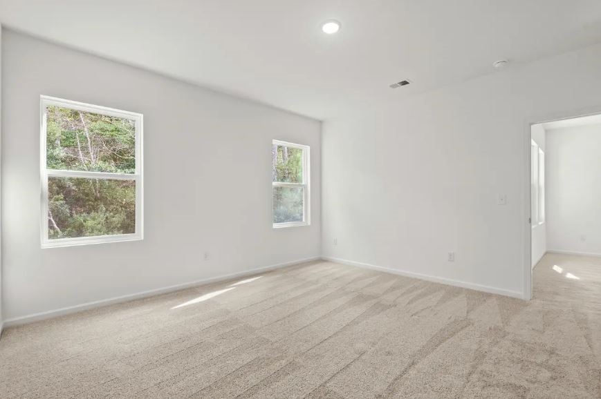 18200 Papuan Cove Elgin, TX 78621 - Photo 11 of 21 an empty room with windows