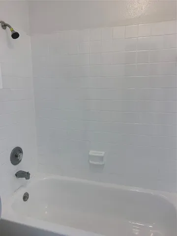 a bathroom with a bathtub