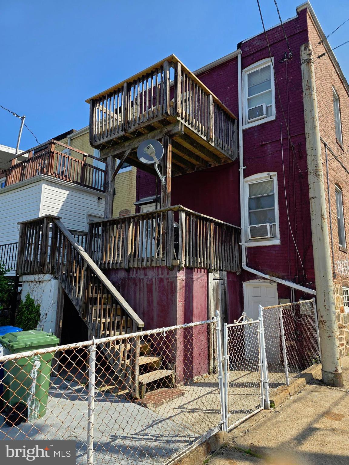 816 Primson Avenue Baltimore, MD 21229 - Photo 4 of 23 a view of a house with iron stairs