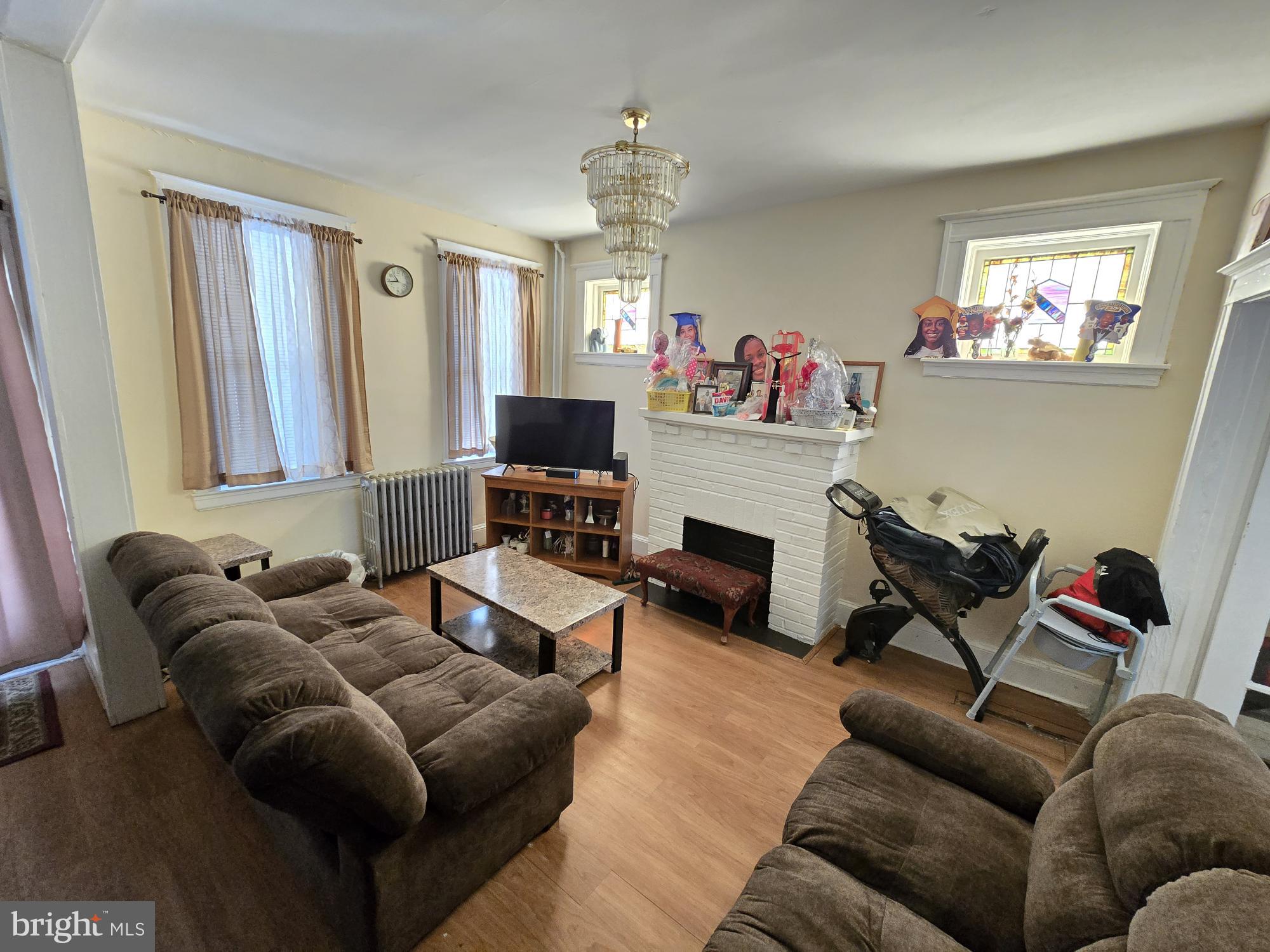 816 Primson Avenue Baltimore, MD 21229 - Photo 7 of 23 a living room with furniture chess board and a window