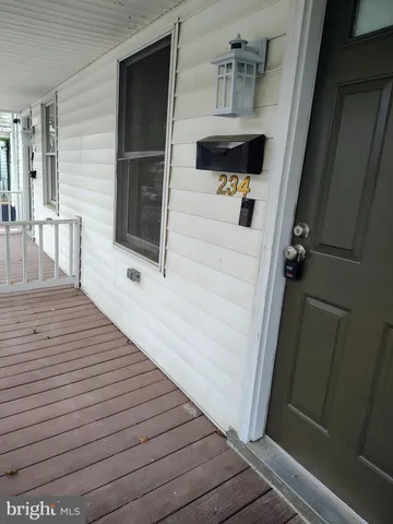 a bathroom with a sink a mirror and shower