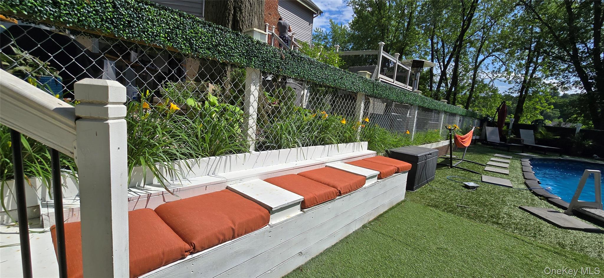 46 Woodland Road Monroe, NY 10950 - Photo 20 of 39 a view of a backyard with sitting area