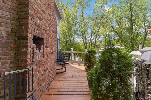 a view of a pathway both side of house