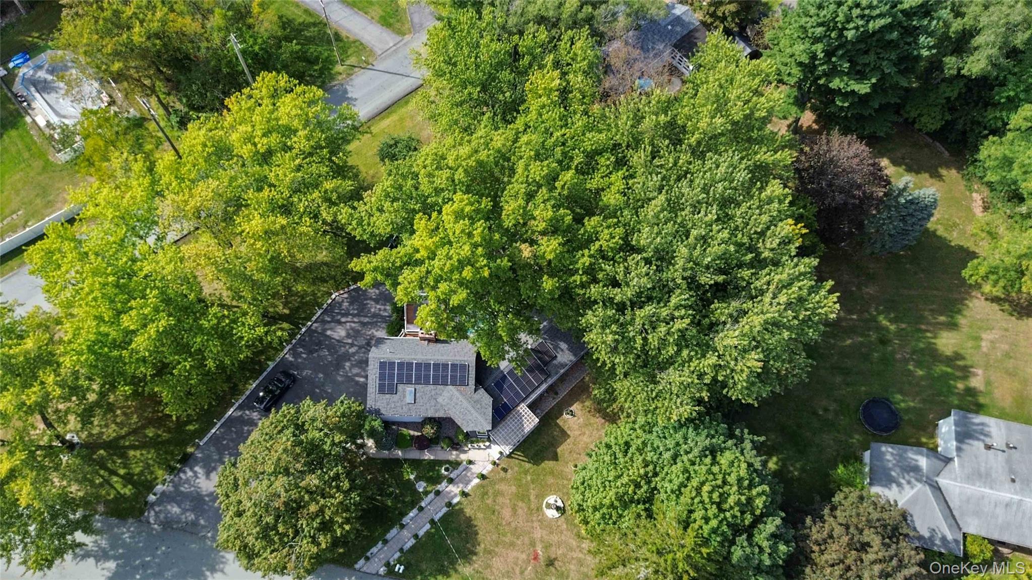 46 Woodland Road Monroe, NY 10950 - Photo 39 of 39 an aerial view of a house with a yard