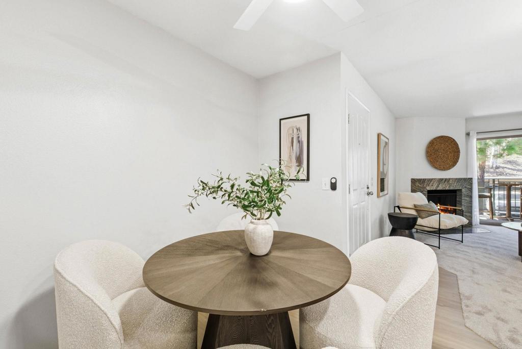 1750 South El Camino Real, Unit 211 Encinitas, CA 92024 - Photo 16 of 44 a living room with furniture and a potted plant