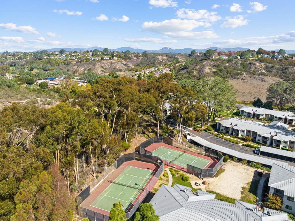 1750 South El Camino Real, Unit 211 Encinitas, CA 92024 - Photo 37 of 44 an aerial view of a residential houses with city view