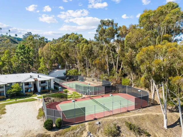 an aerial view of a house with swimming pool