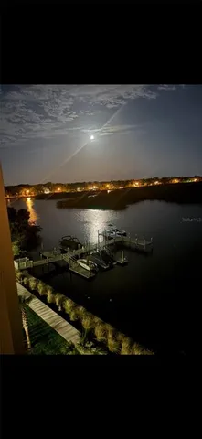 a bathroom with a sink mirror vanity and toilet